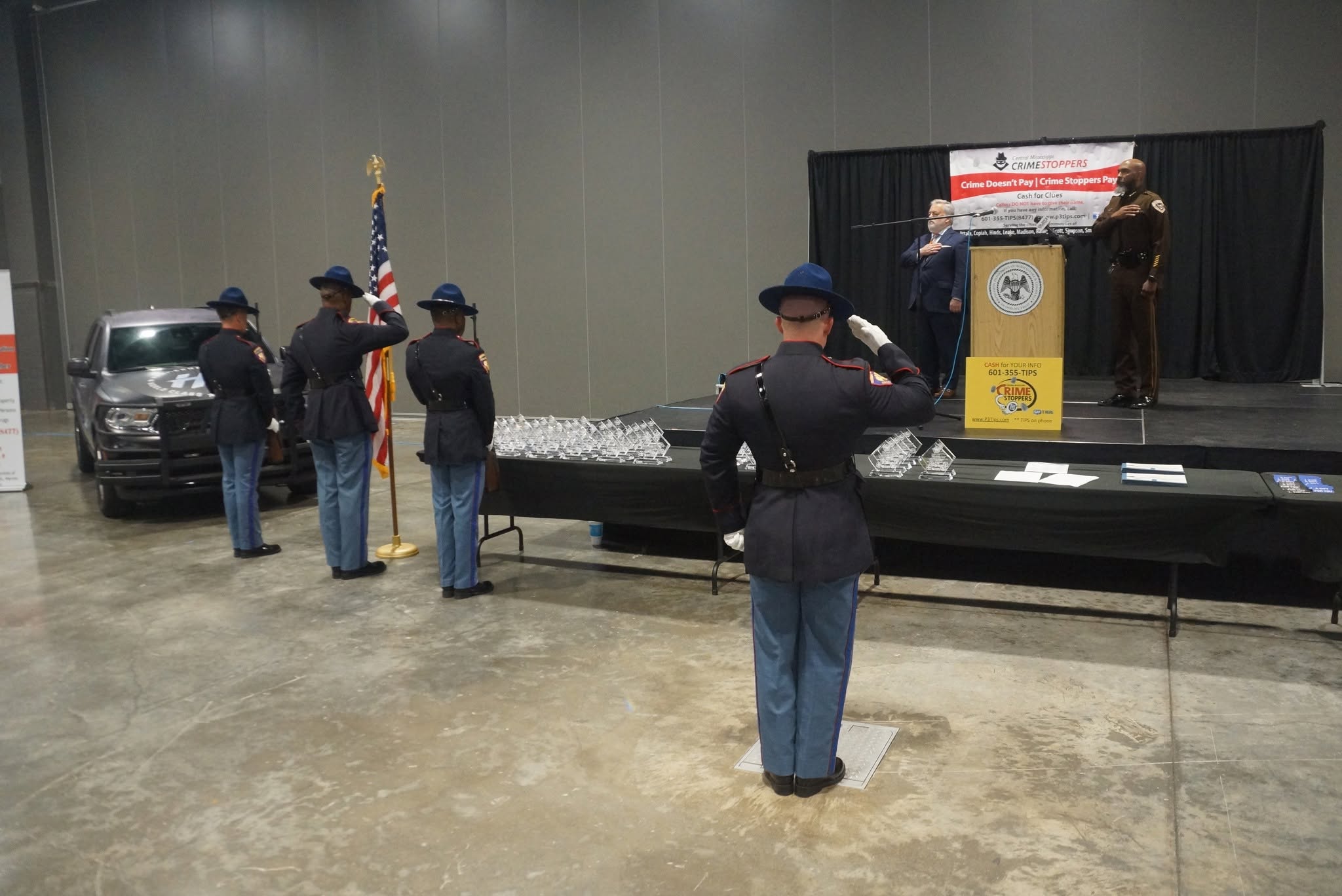 Honor guard saluting during the 2025 Police Memorial and Appreciation Day ceremony